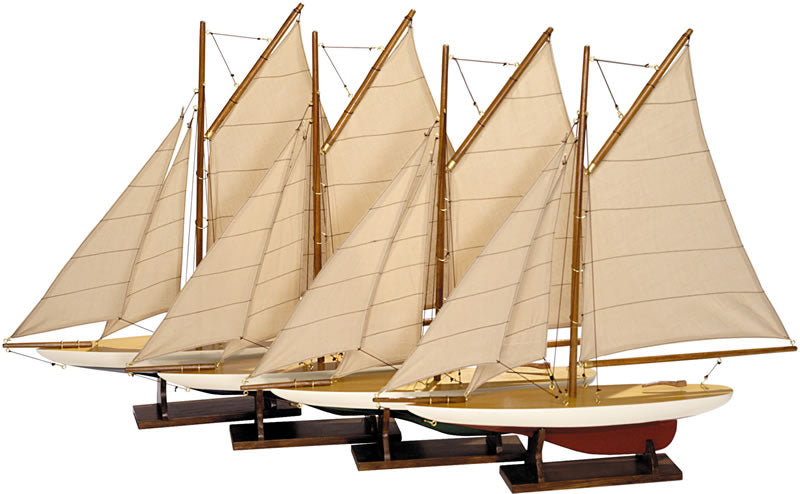 Set of four model sailboats