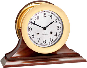 Chelsea 6" Shipstrike Key Wind Clock with Hinge Bezel with traditional wood mantel base.